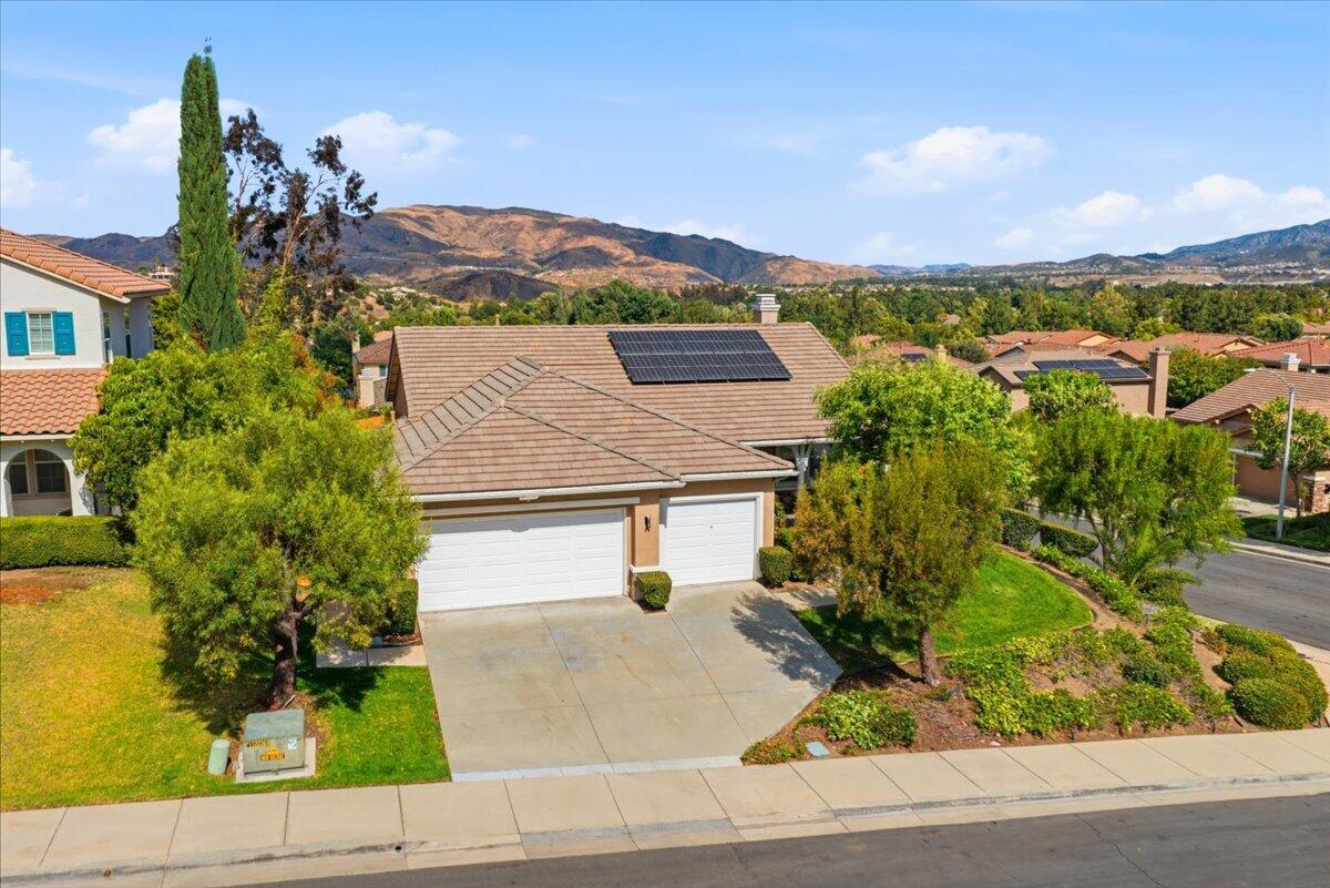 23732 Bella Vista Road Corona, CA 92883 - Photo 38 of 49 an aerial view of a house with a garden