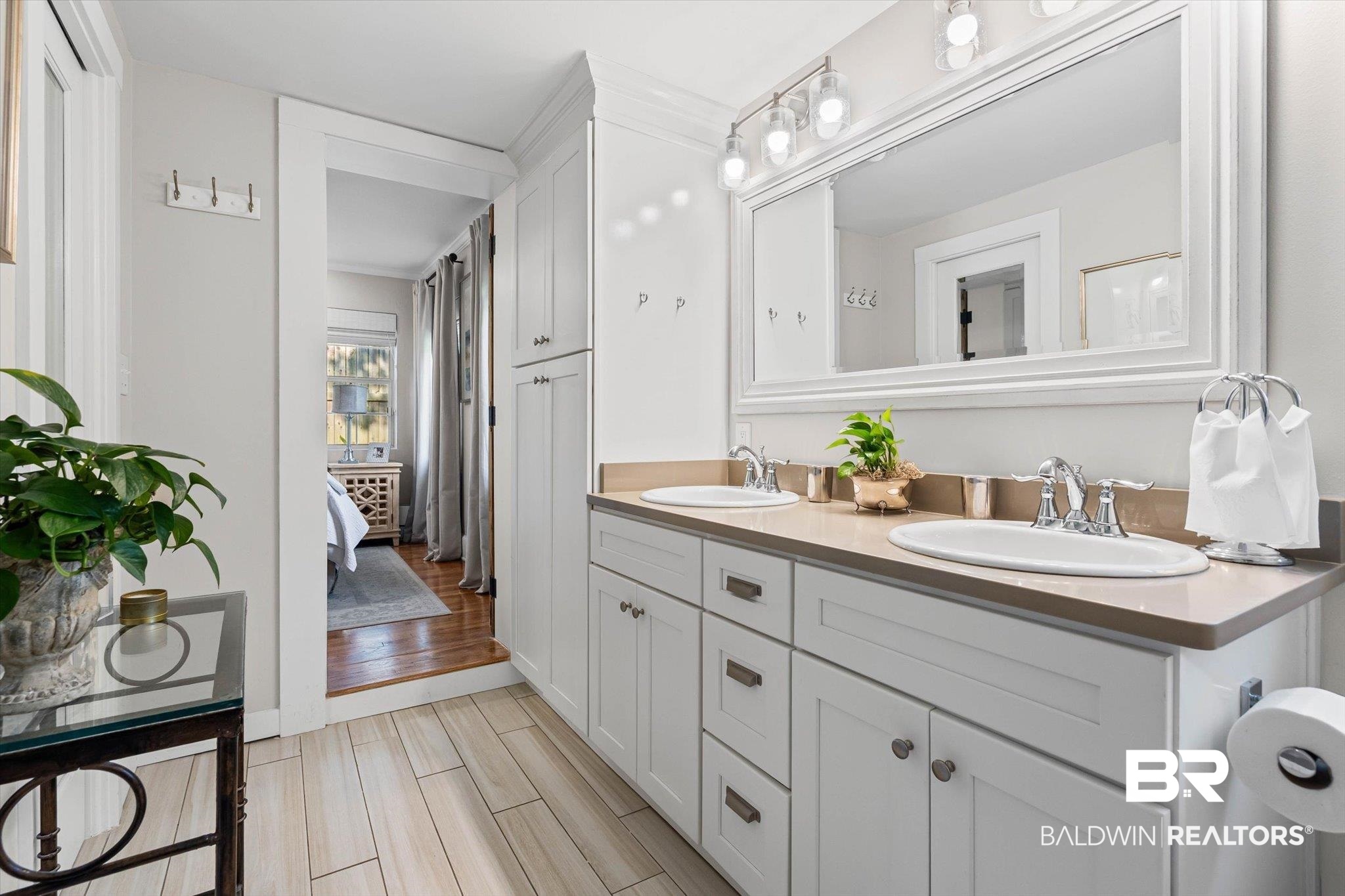 4310 The Cedars Avenue Mobile, AL 36608 - Photo 16 of 32 Ensuite bathroom featuring light wood finished floors and double vanity