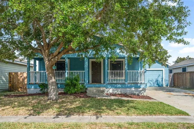 a house view with a backyard space