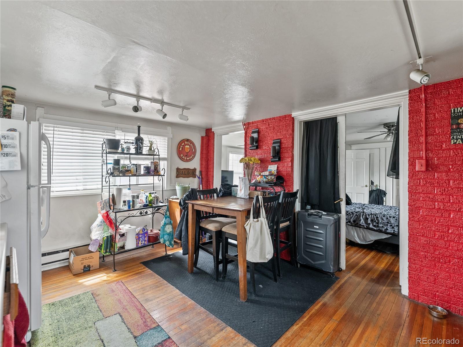 Undisclosed Address Denver, CO 80206 - Photo 21 of 33 a view of a room with lots of stuff