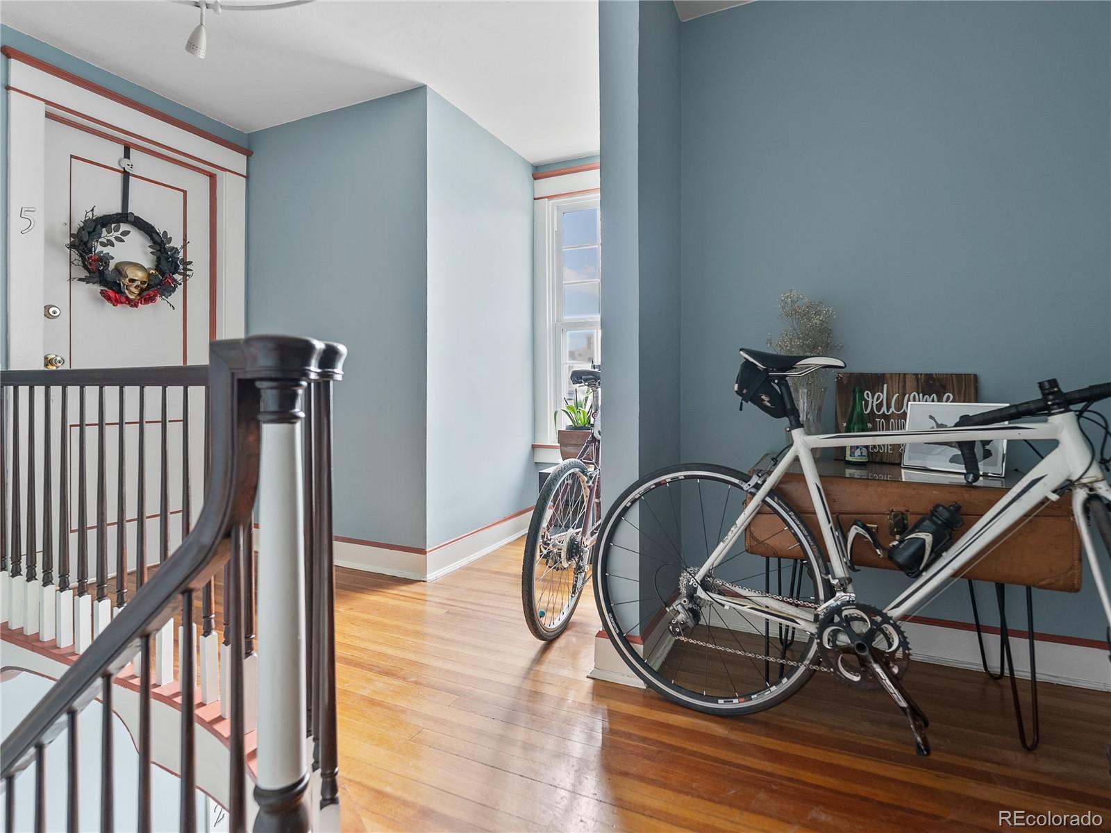 Undisclosed Address Denver, CO 80206 - Photo 3 of 33 a view of a room with gym equipment