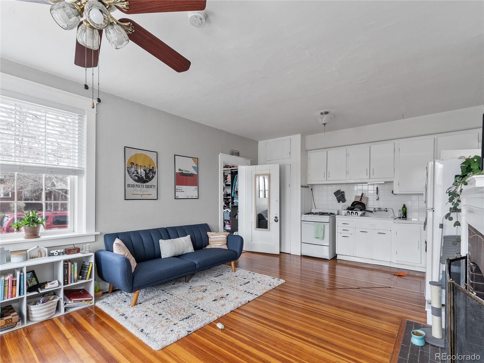Undisclosed Address Denver, CO 80206 - Photo 7 of 33 a living room with furniture and a wooden floor