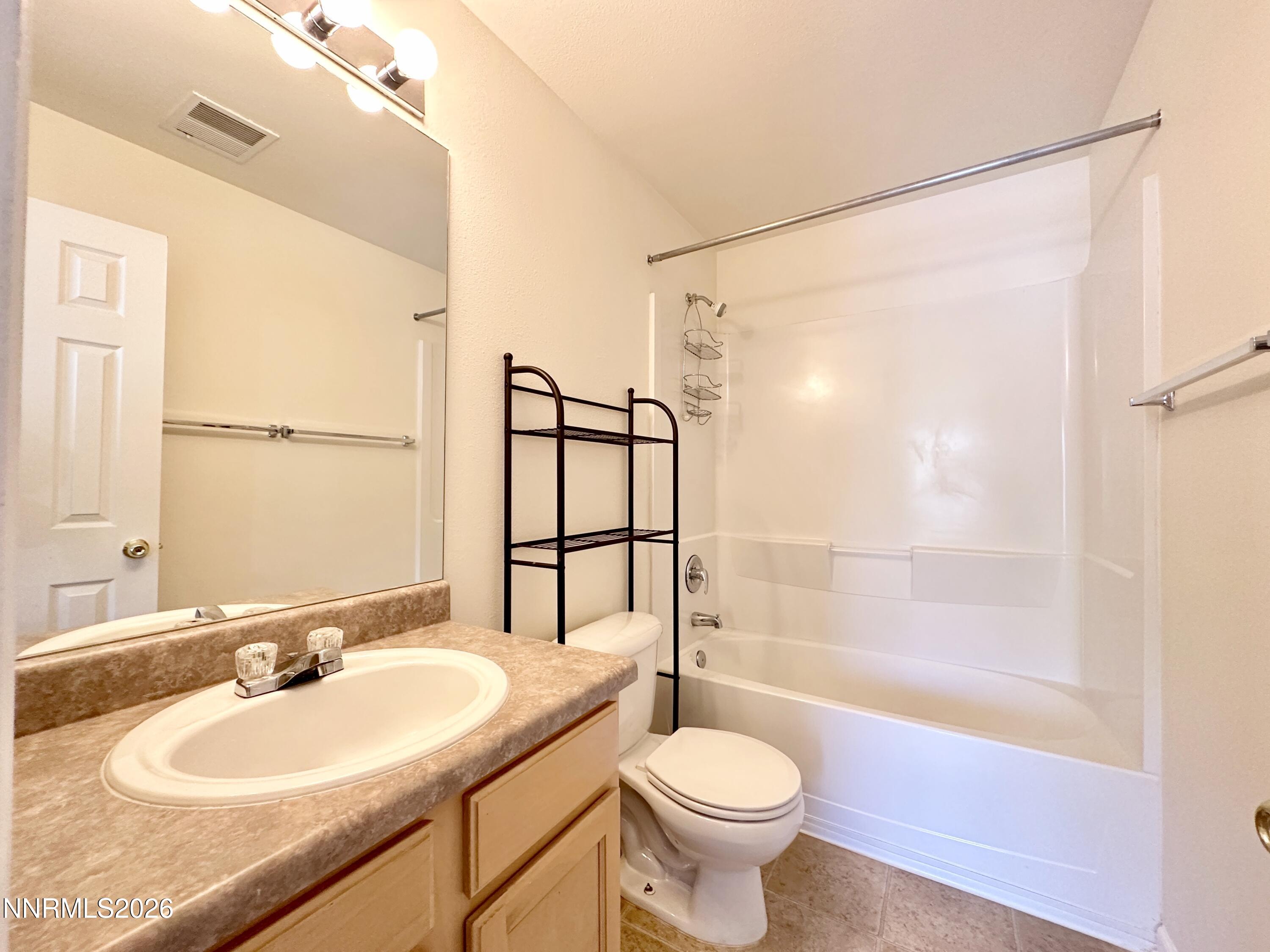 200 Talus Way, Unit 434 Reno, NV 89503 - Photo 13 of 21 a bathroom with a sink toilet and shower
