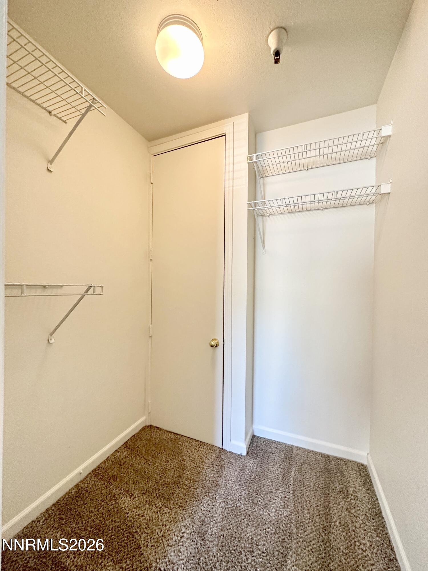 200 Talus Way, Unit 434 Reno, NV 89503 - Photo 15 of 21 a view of small space with empty racks
