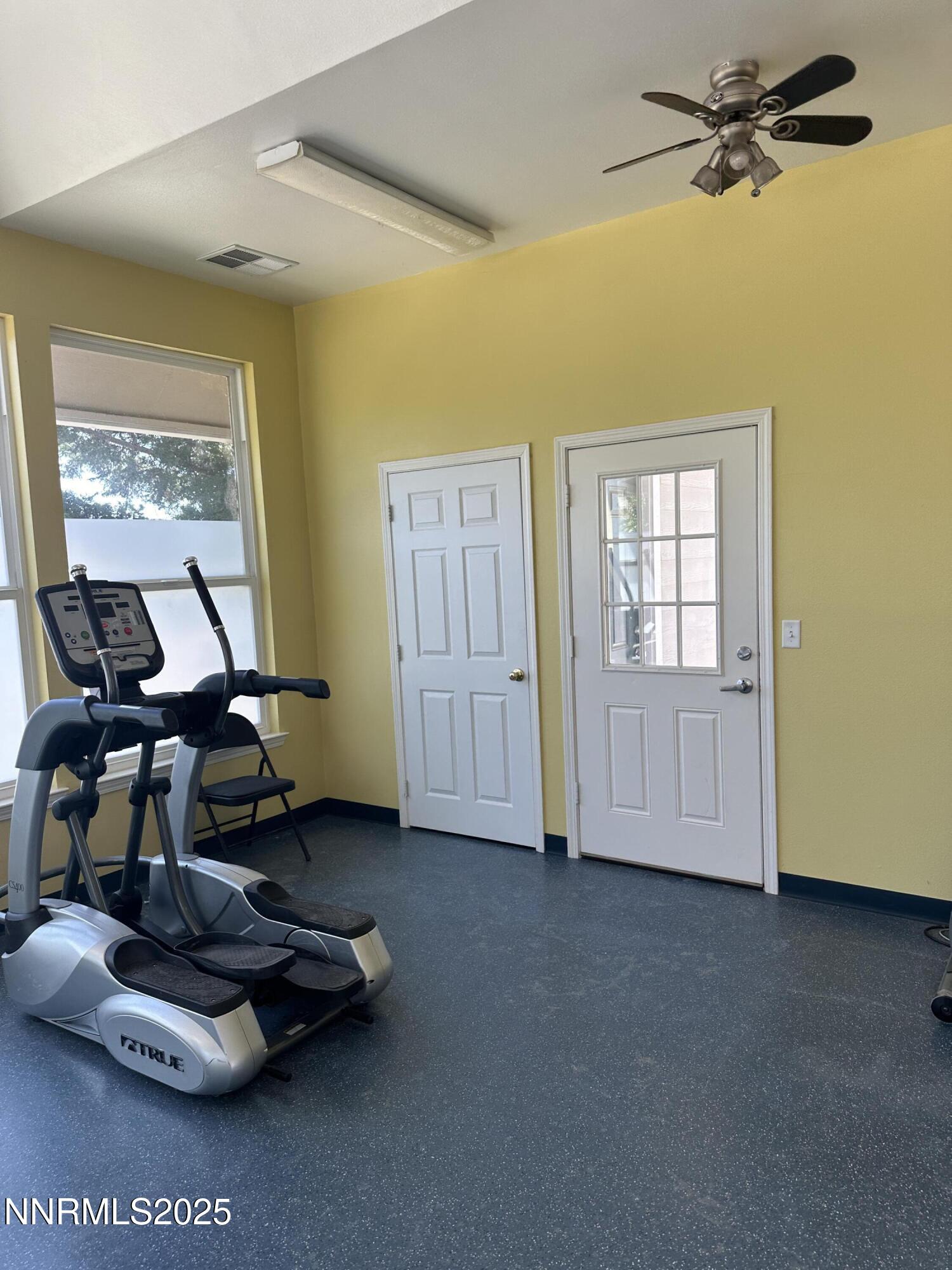 200 Talus Way, Unit 434 Reno, NV 89503 - Photo 19 of 21 a room with furniture and gym equipment