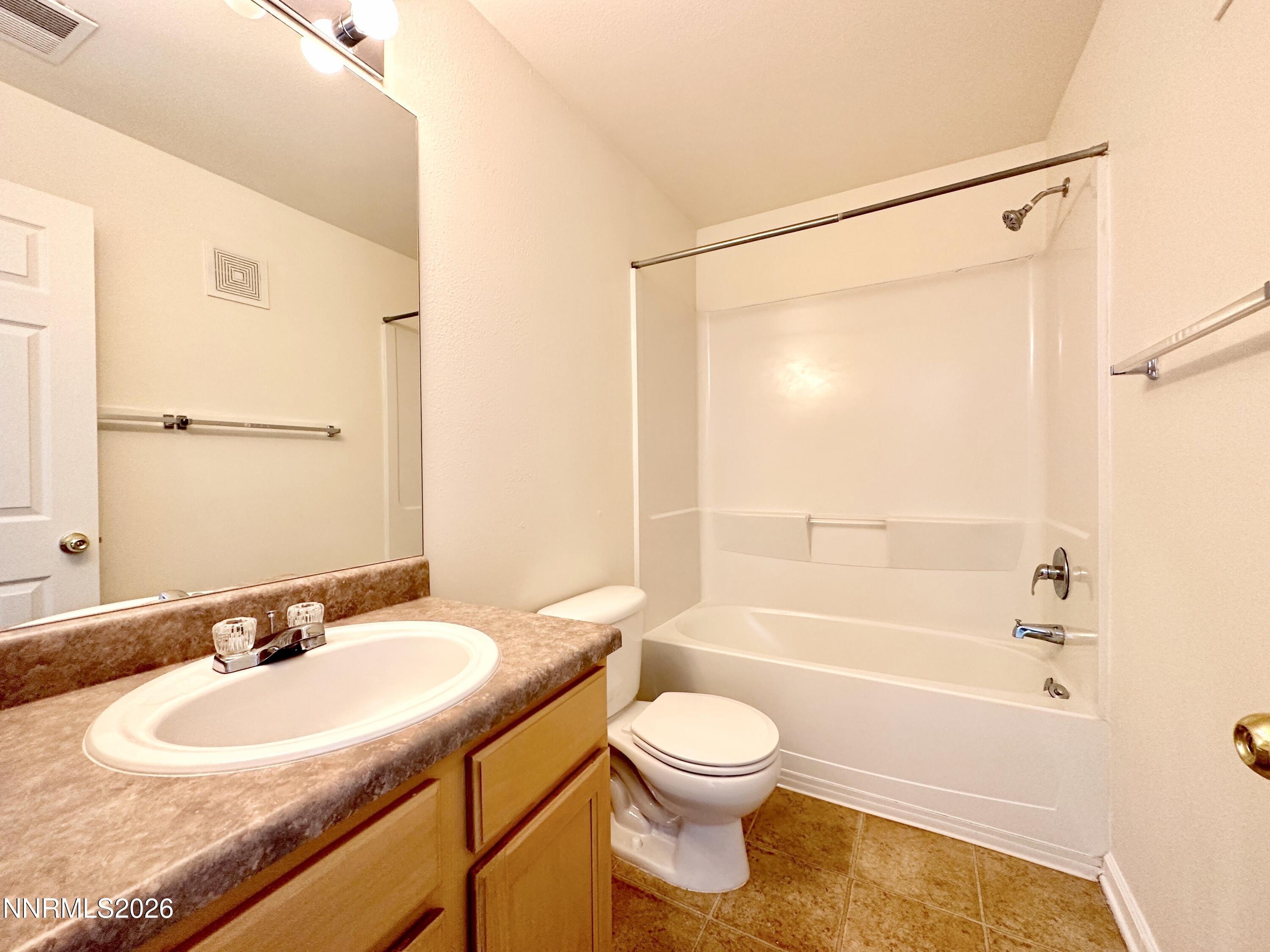 200 Talus Way, Unit 434 Reno, NV 89503 - Photo 9 of 21 a bathroom with a sink toilet and shower