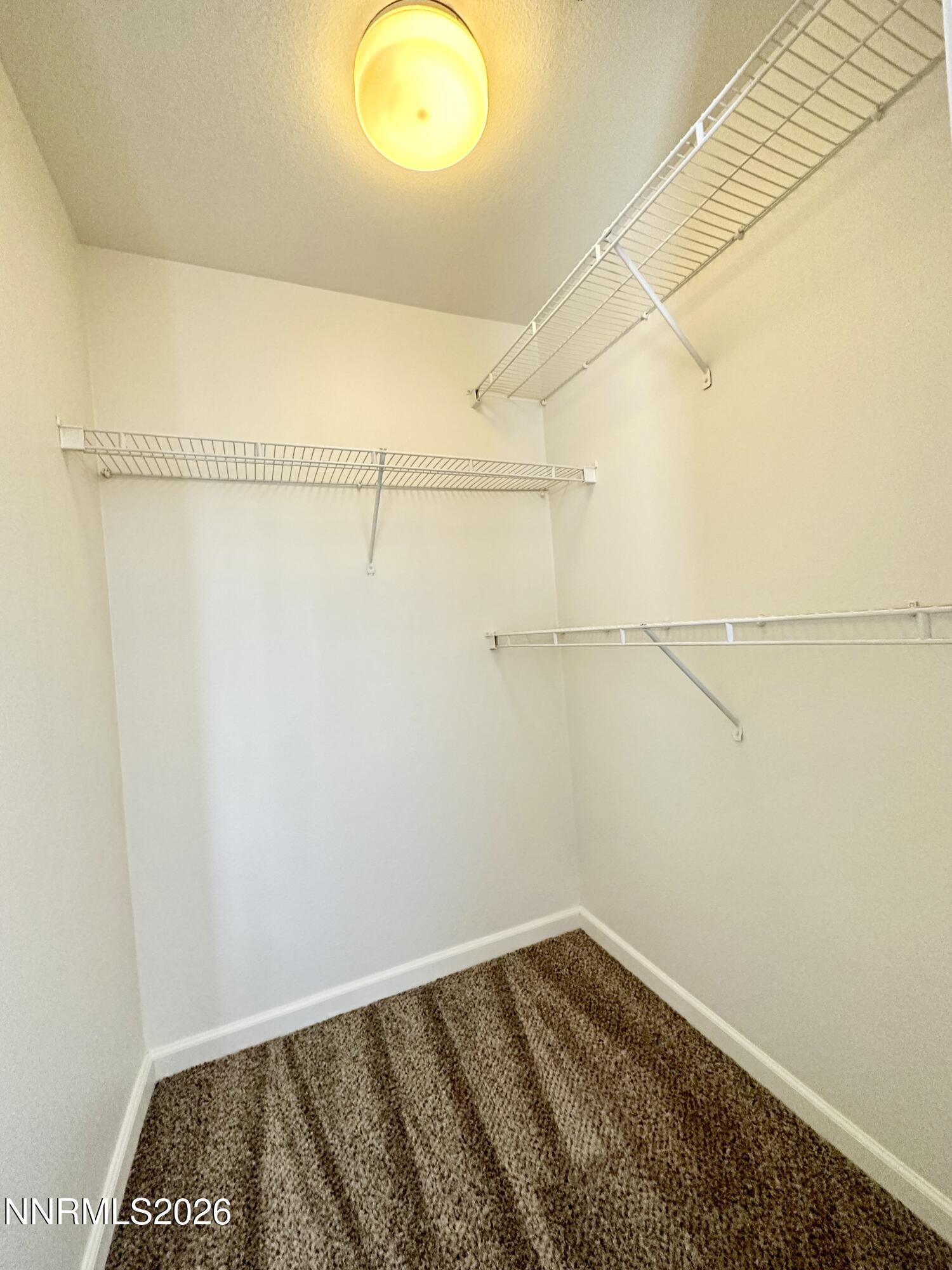 200 Talus Way, Unit 434 Reno, NV 89503 - Photo 10 of 21 a view of a room with racks on the wall