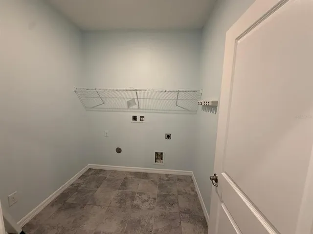 a view of a room with racks on the wall