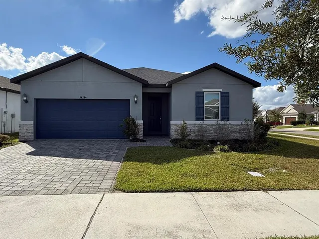 a house view with a garden space