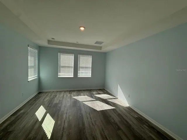 an empty room with windows