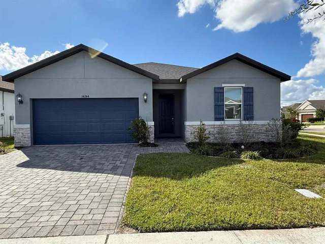 a house view with a garden space