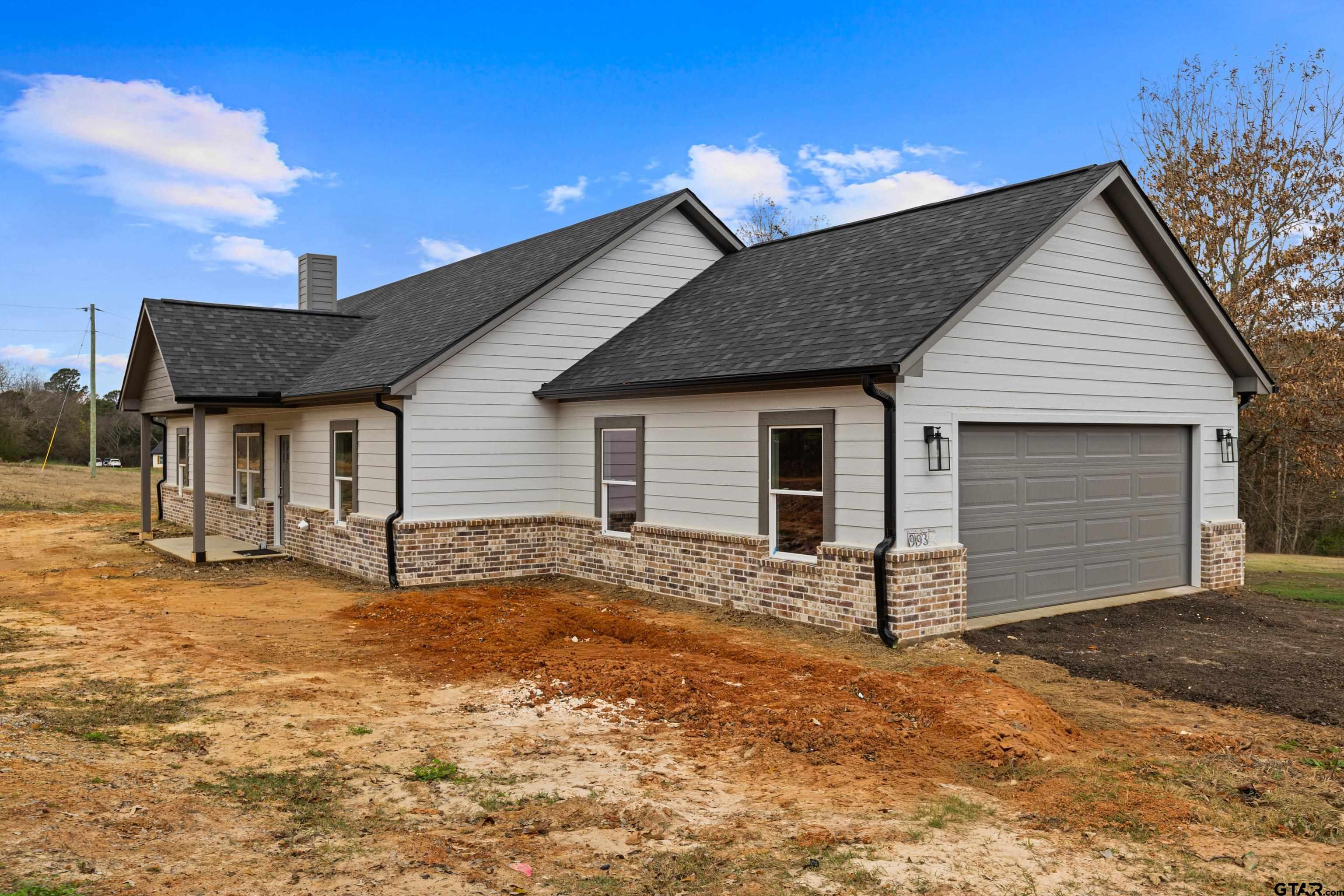 9934 Bob O Link Road Gladewater, TX 75647 - Photo 2 of 37 a view of a house with backyard