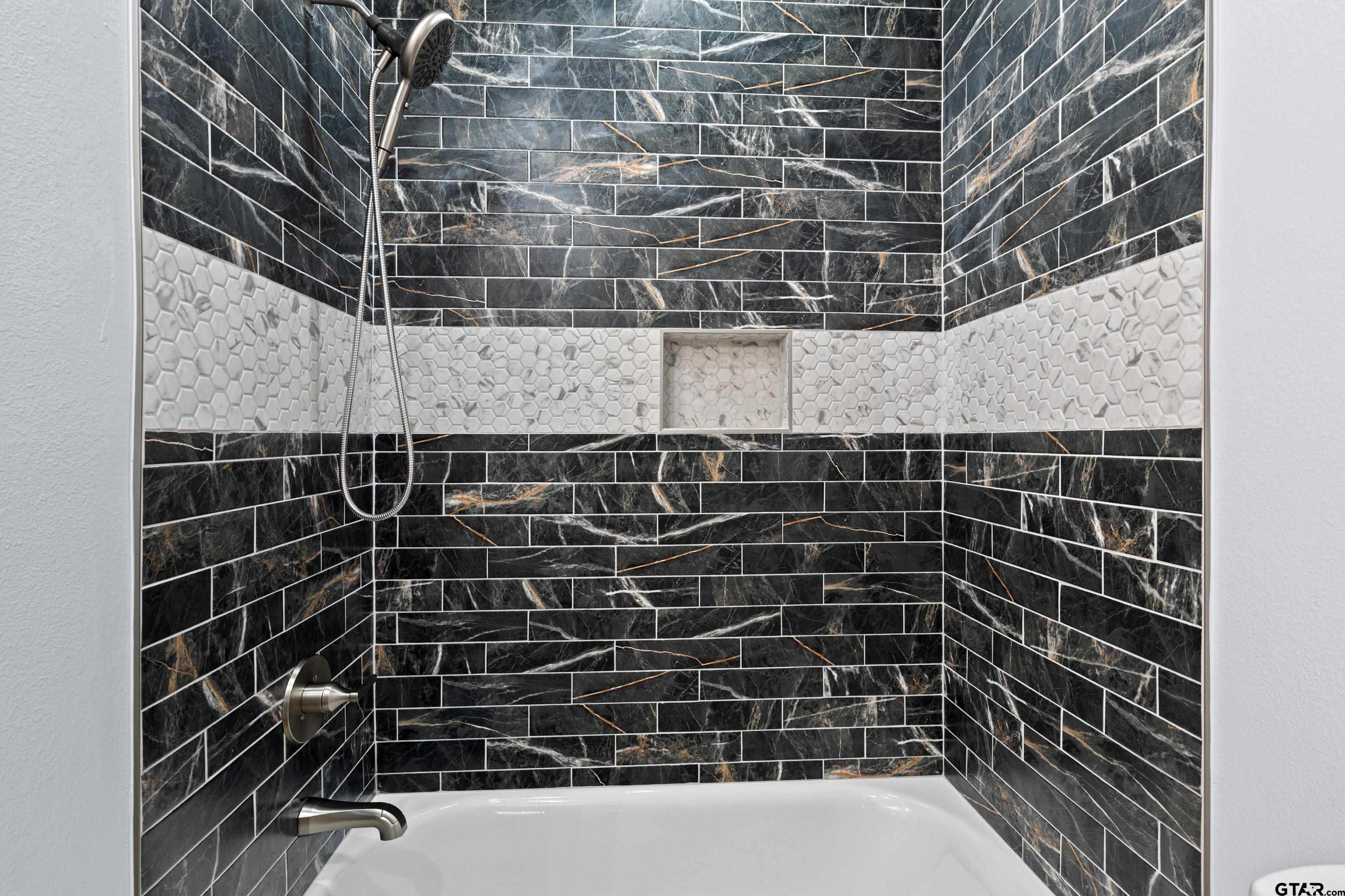 9934 Bob O Link Road Gladewater, TX 75647 - Photo 25 of 37 a bathroom with a shower