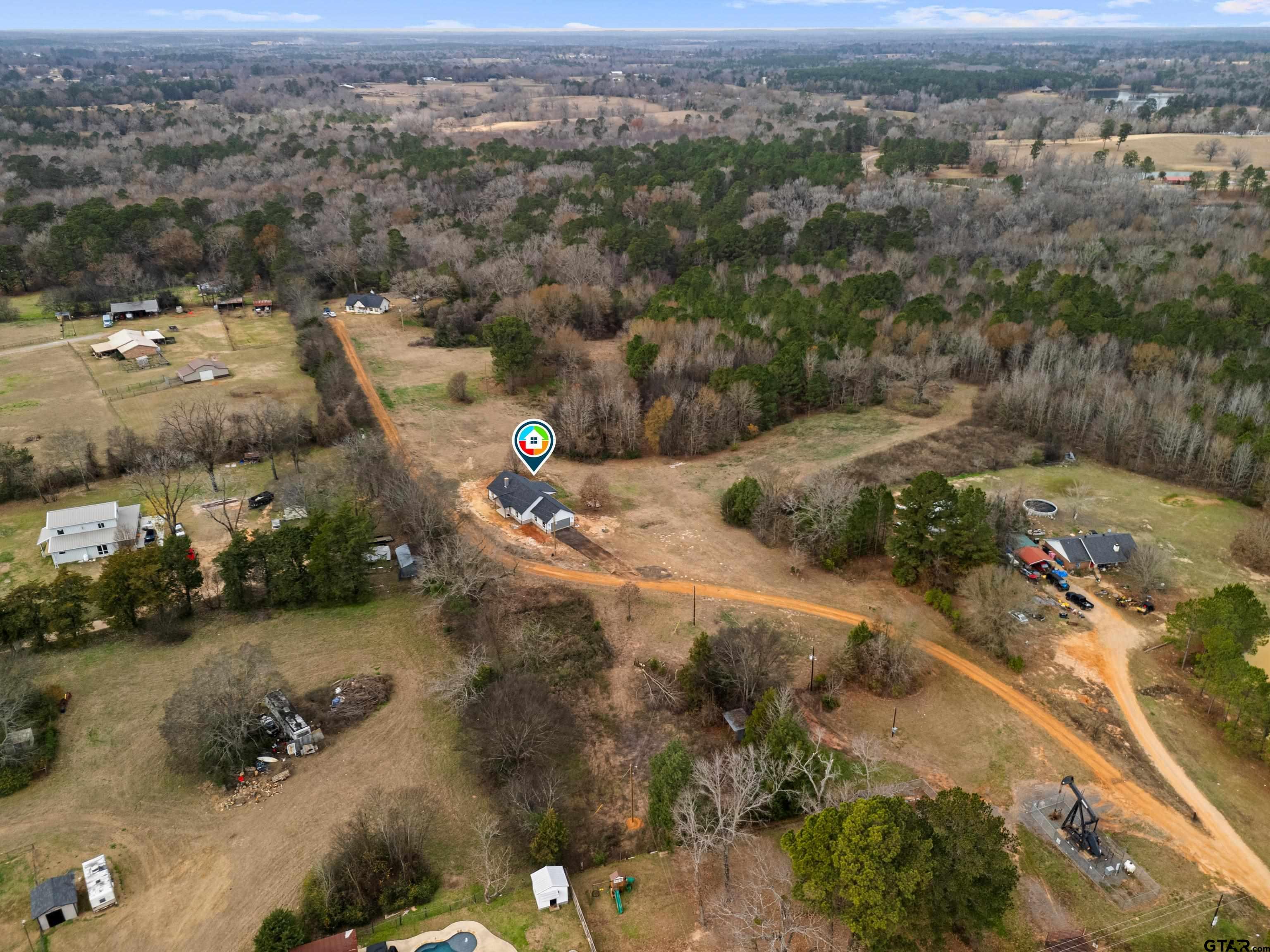 9934 Bob O Link Road Gladewater, TX 75647 - Photo 9 of 37 an aerial view of multiple house