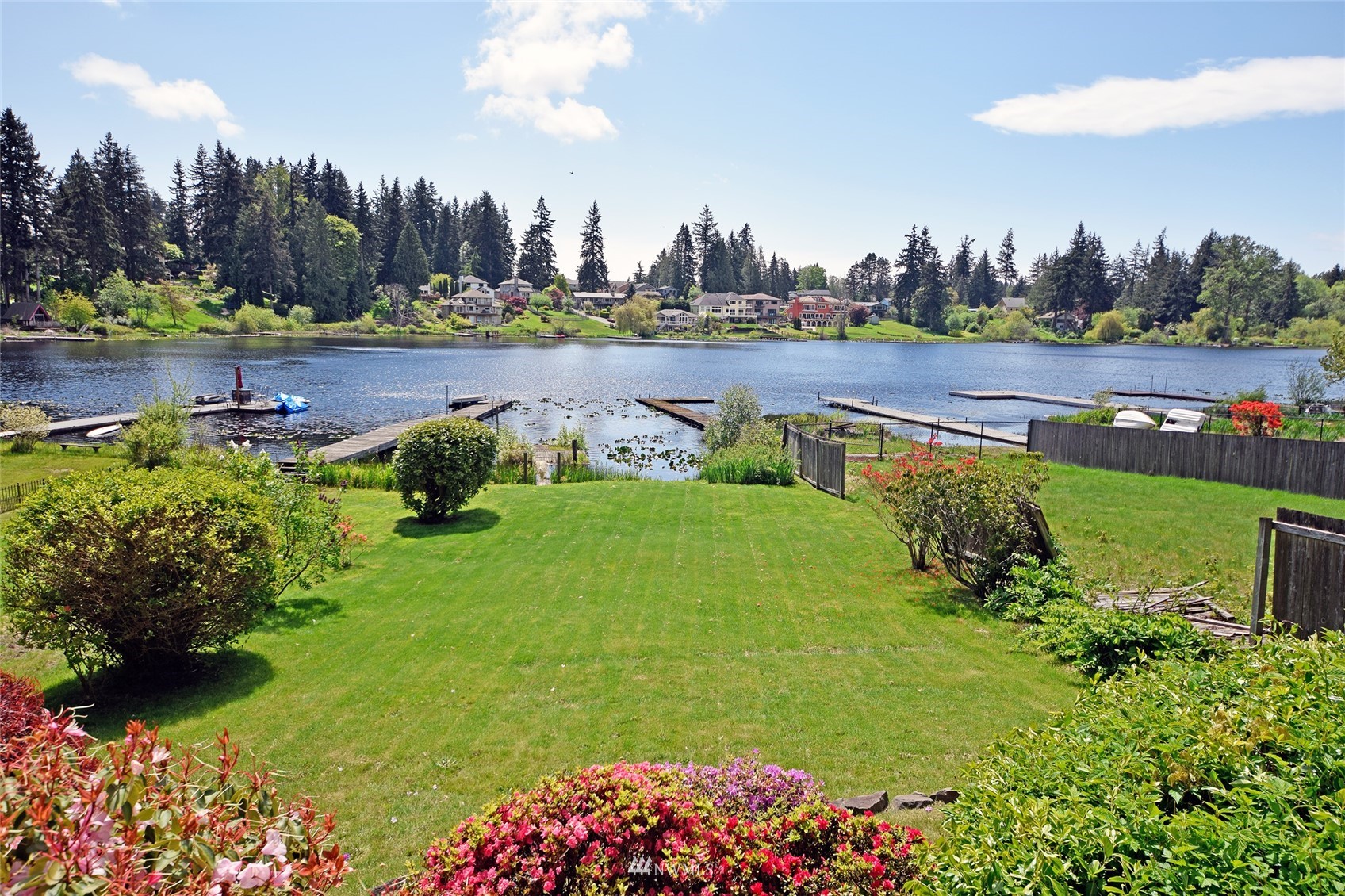 a view of a garden with a lake