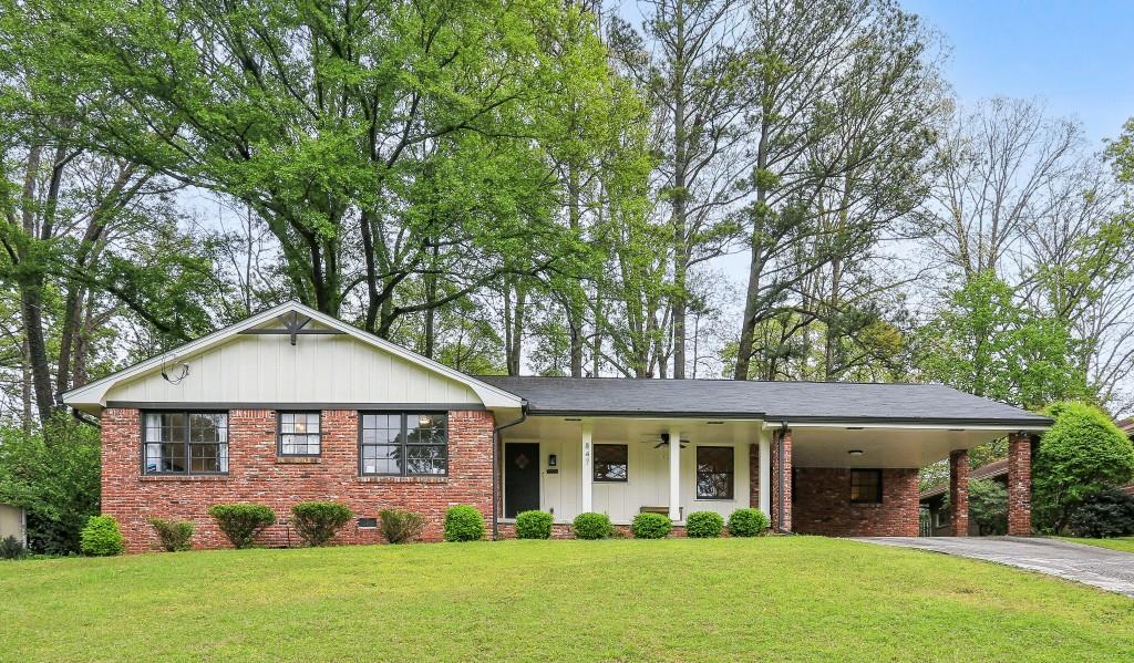 847 North Superior Avenue Decatur, GA 30033 - Photo 1 of 1 a front view of a house with a yard and green space