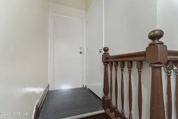 a view of a hallway with entryway