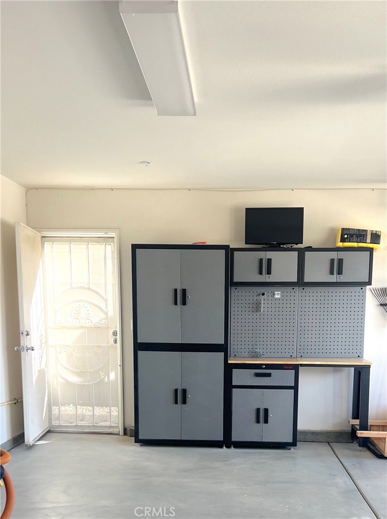 15765 Gable Street Victorville, CA 92394 - Photo 12 of 12 a room with a cabinet and mirrors