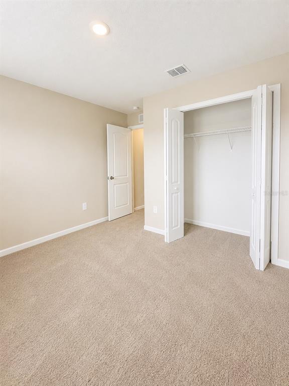 339 Redbud Road Palm Coast, FL 32137 - Photo 13 of 22 a view of an empty room