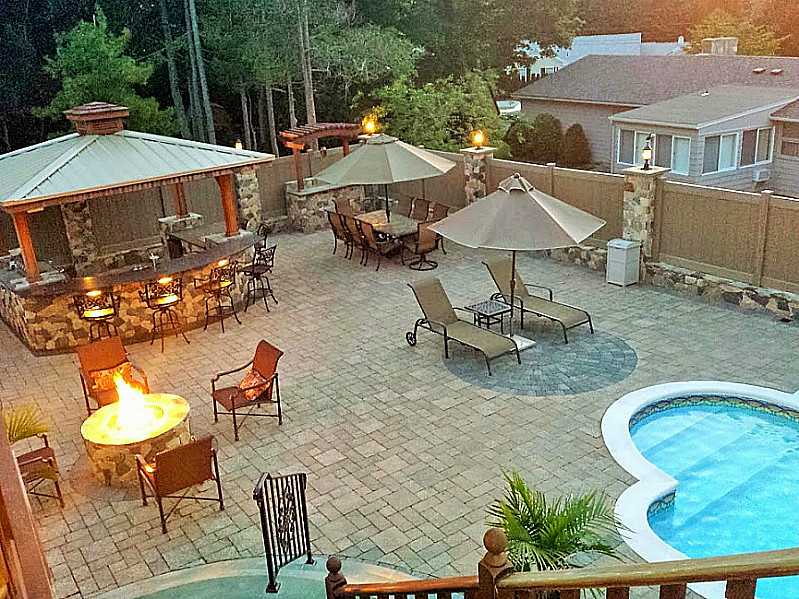 58 Applegate Road Cranston, RI 02920 - Photo 19 of 25 Swimming Pool/Hot Tub/Sauna. Evening with Gas Fire pit in use