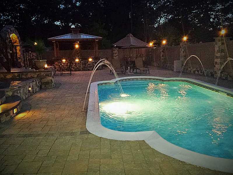 58 Applegate Road Cranston, RI 02920 - Photo 24 of 25 Swimming Pool/Hot Tub/Sauna. Lit up at night with fountain sprays