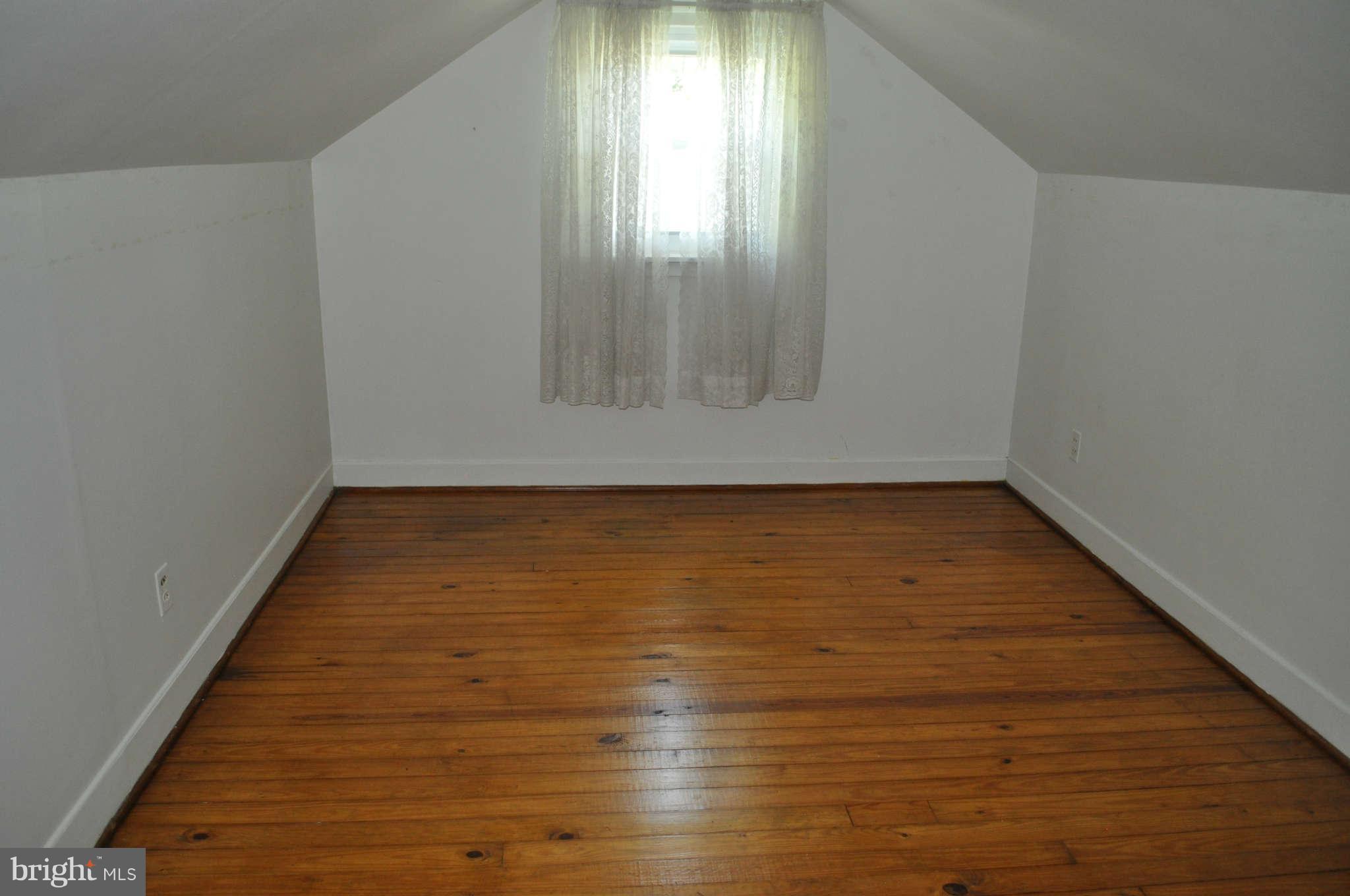 1021 Kingston Road Baltimore, MD 21208 - Photo 14 of 20 a view of room with window