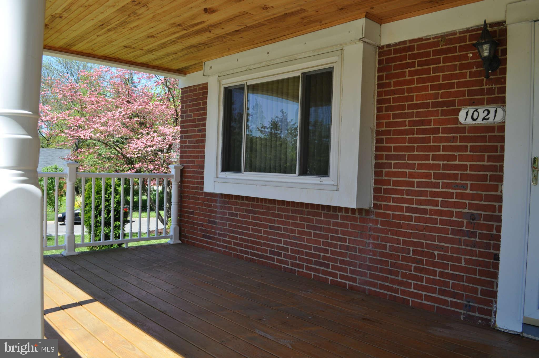 1021 Kingston Road Baltimore, MD 21208 - Photo 20 of 20 a view of a brick house with a large window
