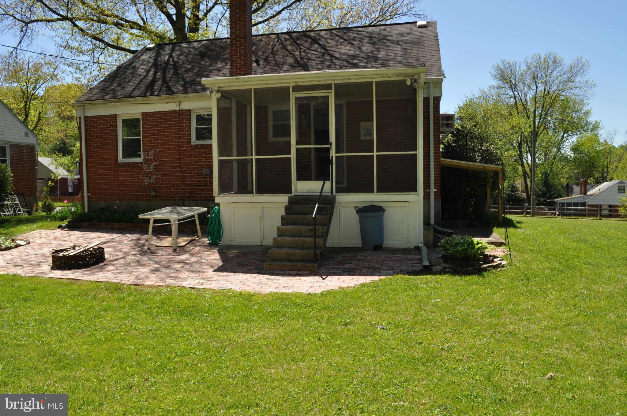 1021 Kingston Road Baltimore, MD 21208 - Photo 5 of 20 a front view of house with yard