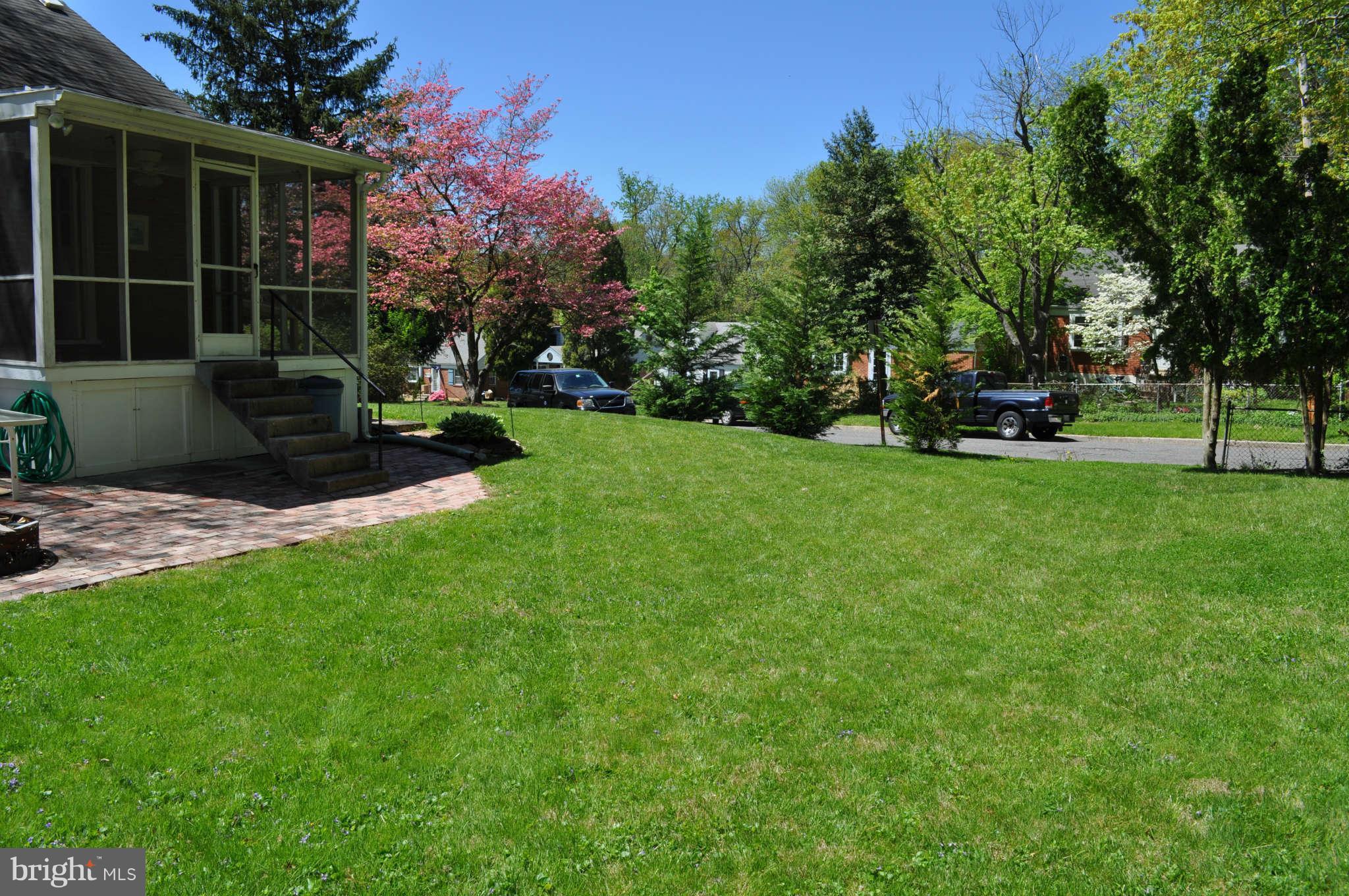 1021 Kingston Road Baltimore, MD 21208 - Photo 7 of 20 a view of a garden with a bench
