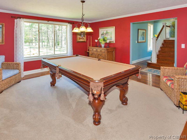 155 Lillys Neck Road Moon, VA 23119 - Photo 16 of 38 Family room with large pool table and gas fireplace