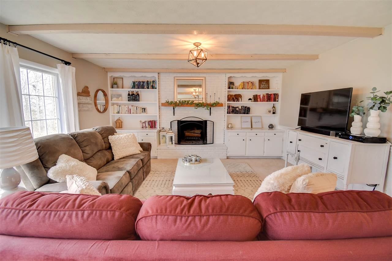 630 Bailey Road Fort Defiance, VA 24437 - Photo 2 of 22 a living room with furniture fireplace and flat screen tv