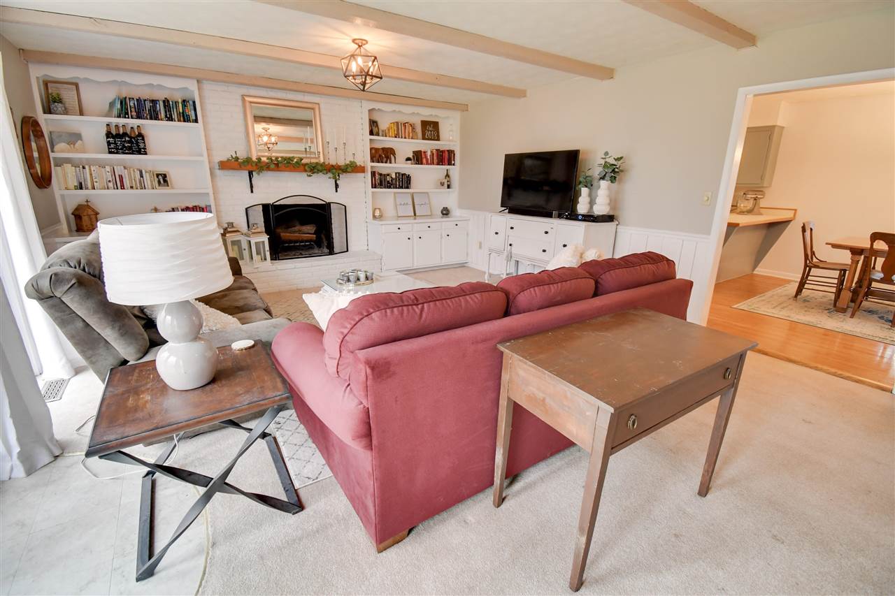630 Bailey Road Fort Defiance, VA 24437 - Photo 4 of 22 a living room with furniture a flat screen tv and a fireplace