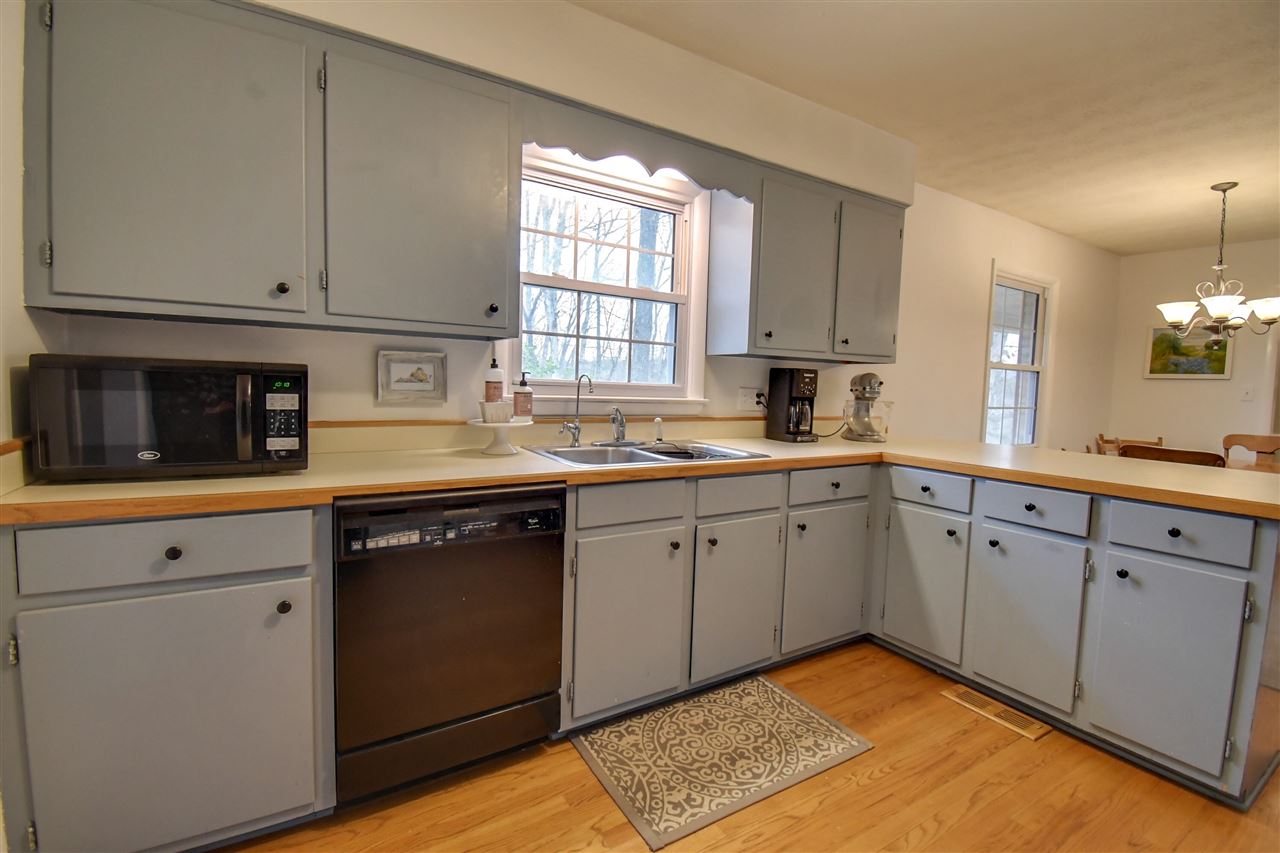 630 Bailey Road Fort Defiance, VA 24437 - Photo 8 of 22 a kitchen with a sink cabinets and window