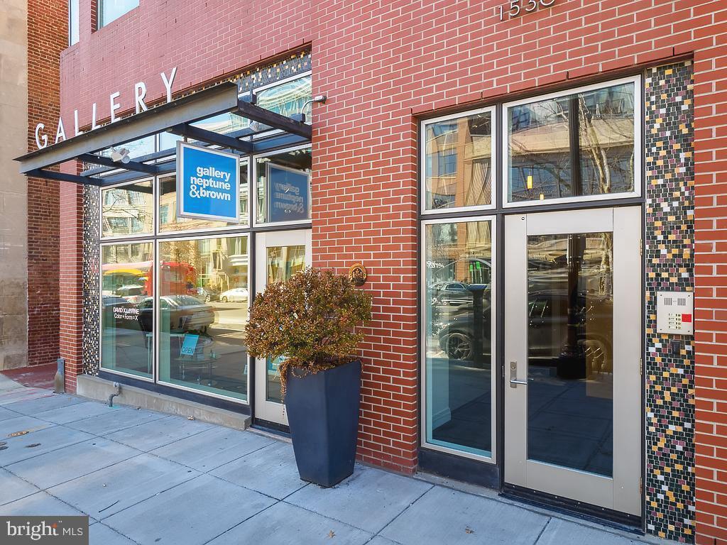 1530 14th Street Northwest, Unit 3B Washington, DC 20005 - Photo 22 of 28 a view of a brick house with a glass door