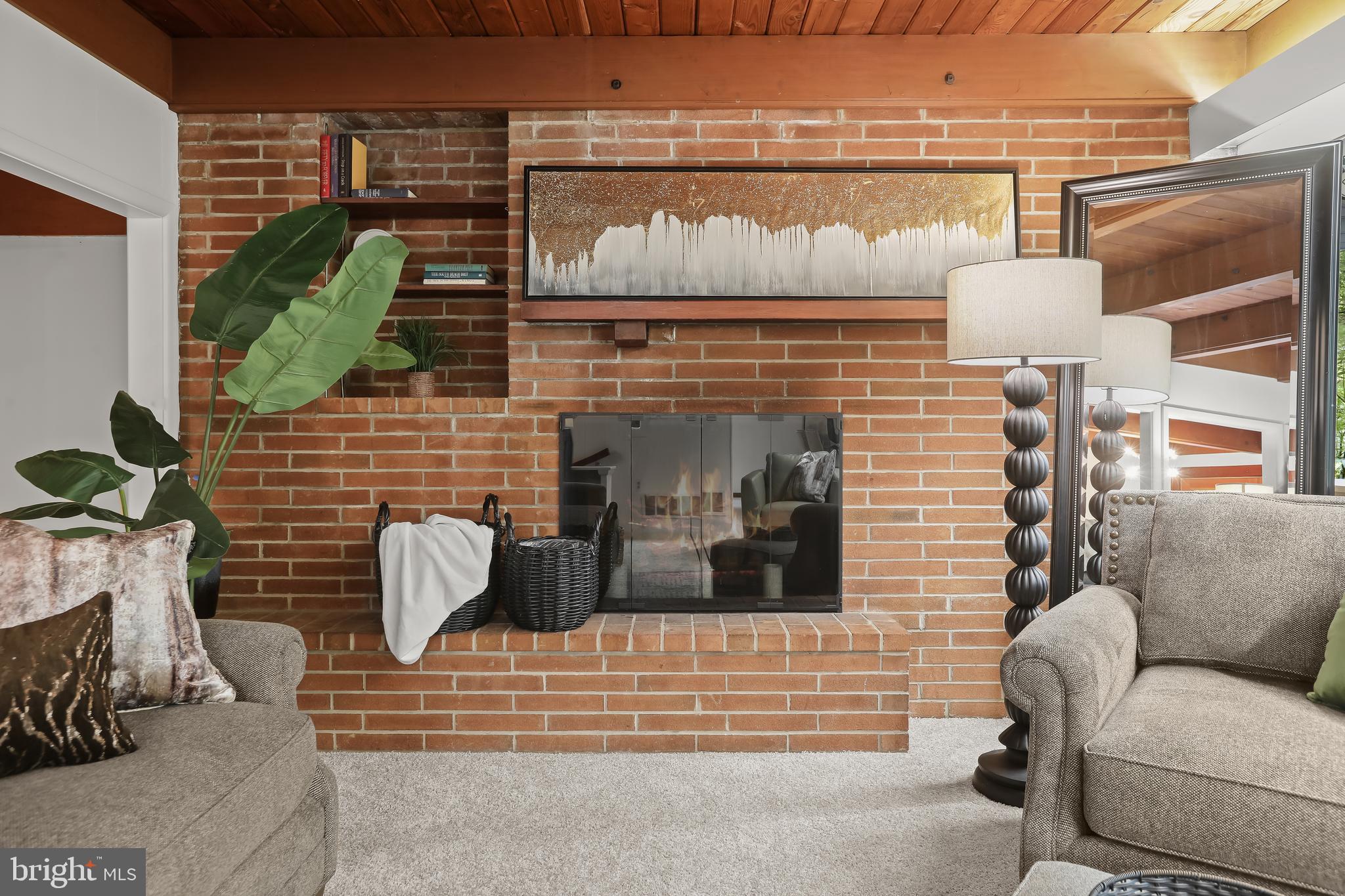 1725 St Giles Road Gibson Island, MD 21056 - Photo 14 of 43 Wood Burning Fireplace with Glass Front