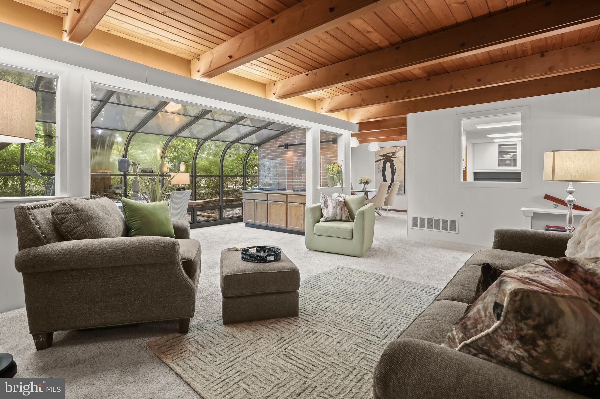 1725 St Giles Road Gibson Island, MD 21056 - Photo 16 of 43 Living Room Opens to Sunroom