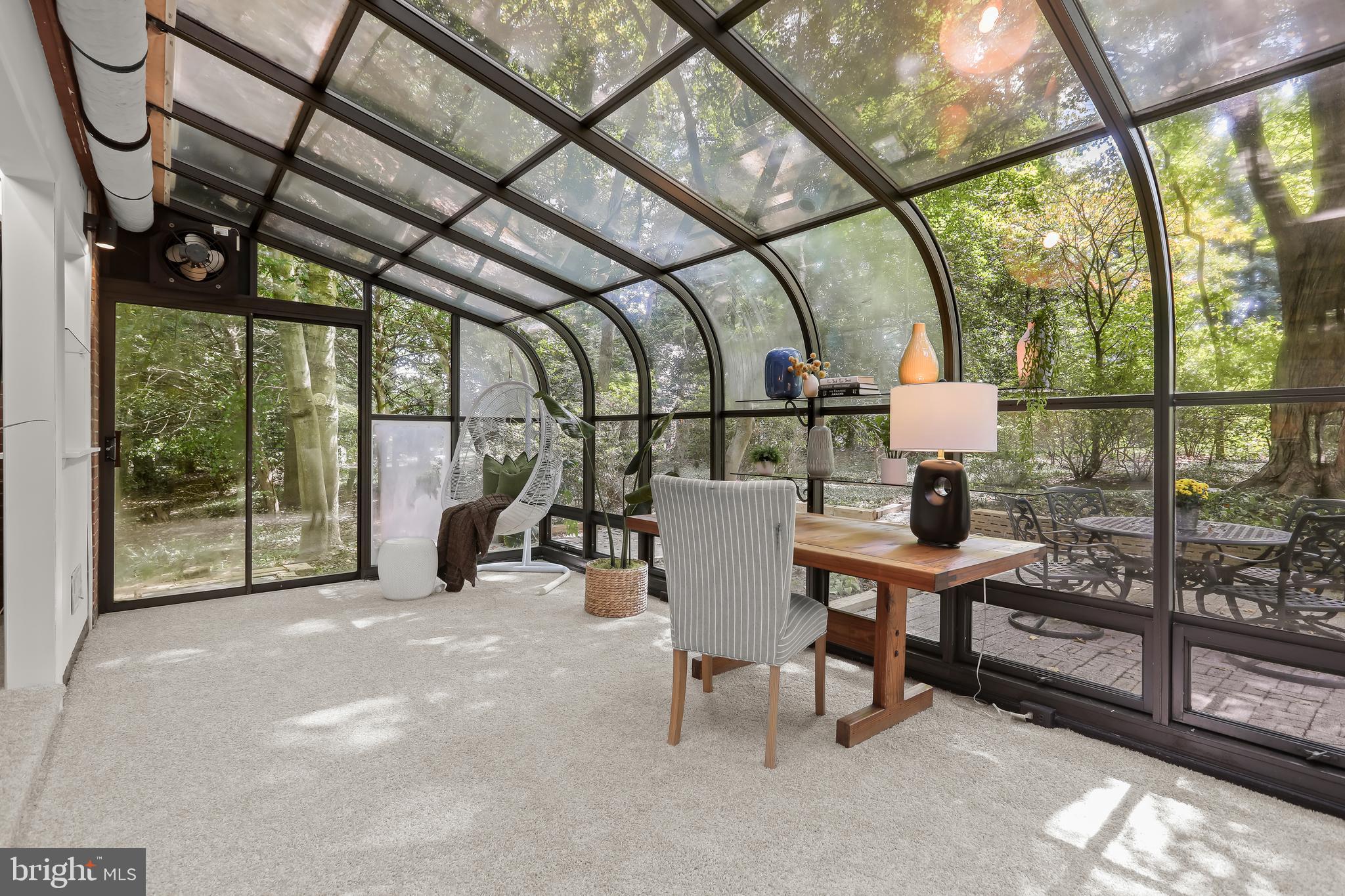 1725 St Giles Road Gibson Island, MD 21056 - Photo 18 of 43 Sunroom with Shades Along Glass Ceiling