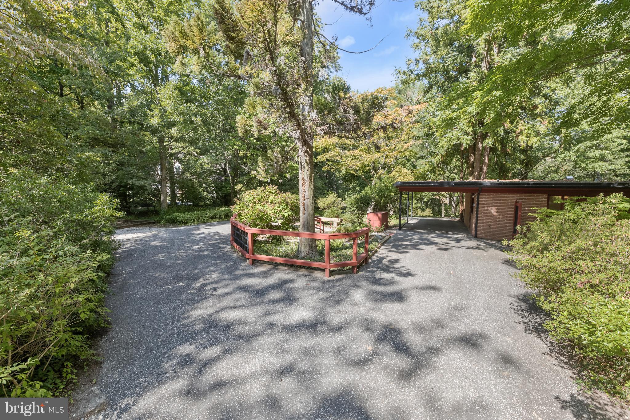 1725 St Giles Road Gibson Island, MD 21056 - Photo 2 of 43 Circular Driveway w/ two Entryways and Carport