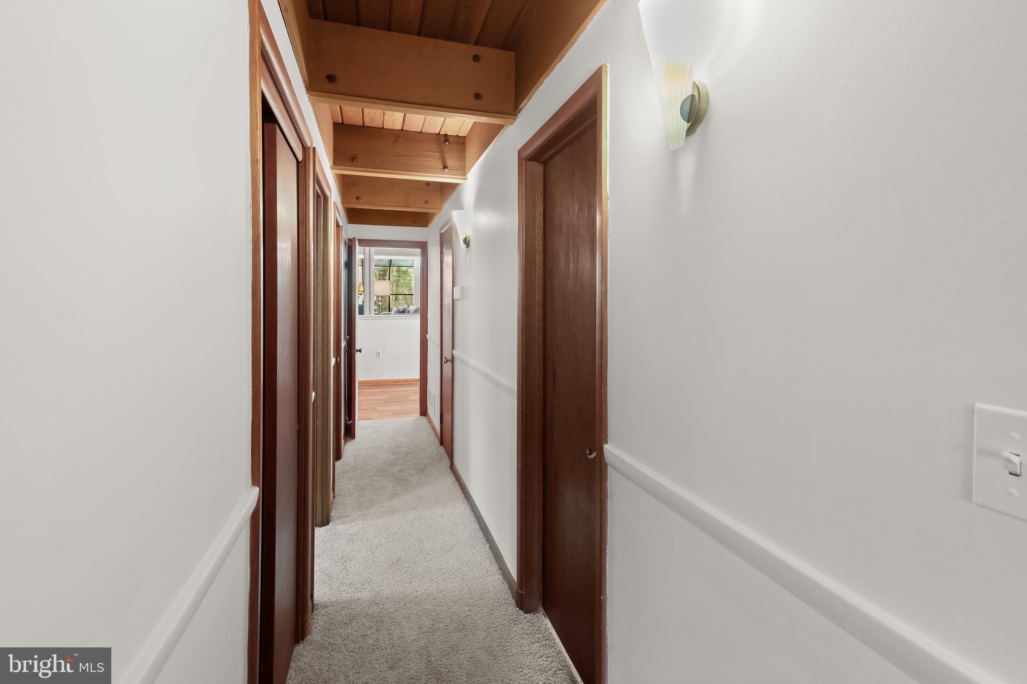 1725 St Giles Road Gibson Island, MD 21056 - Photo 26 of 43 Hallway with Beamed Wood Ceiling