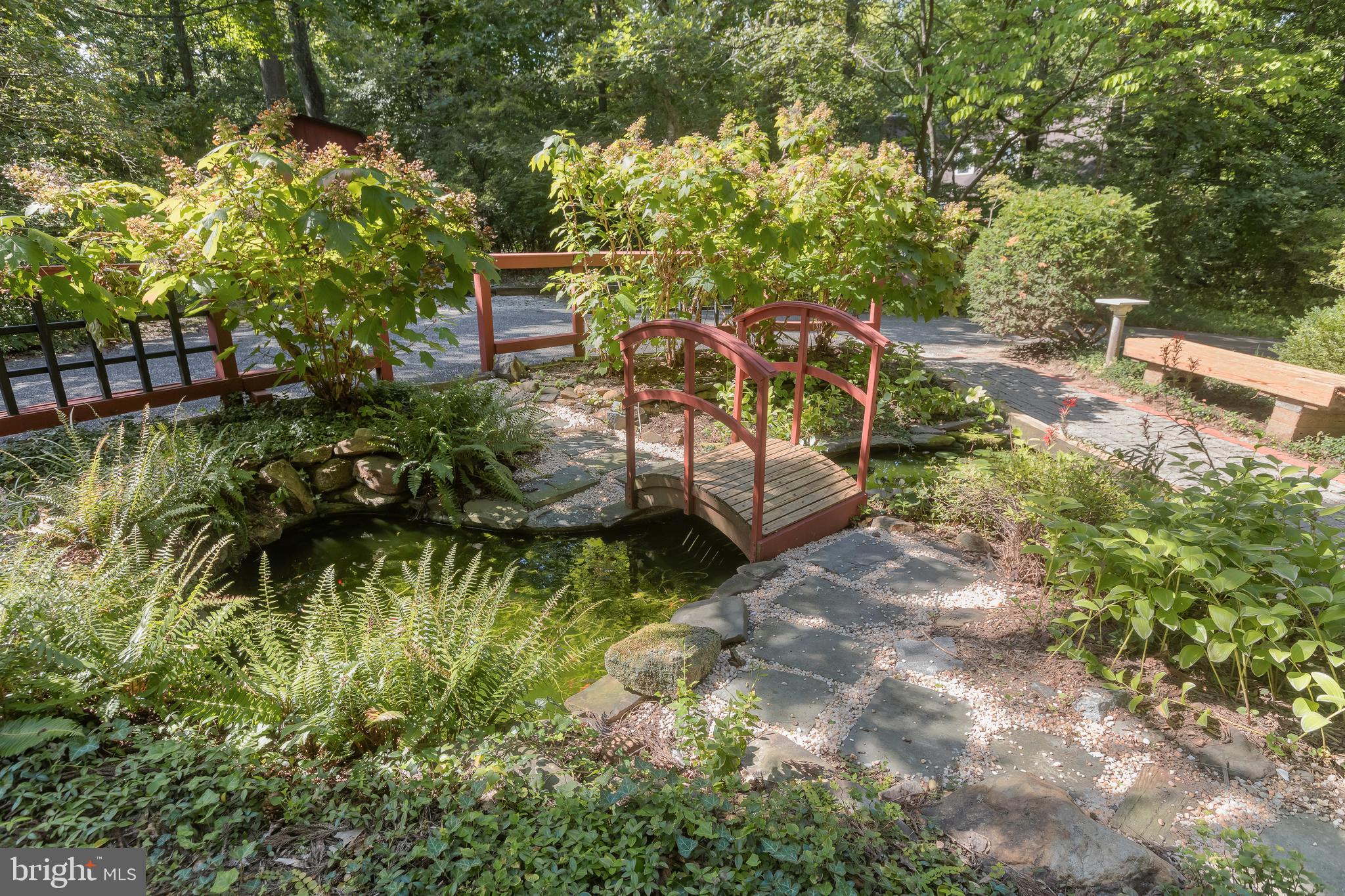 1725 St Giles Road Gibson Island, MD 21056 - Photo 3 of 43 Lily Pond in the Middle of Circular Driveway