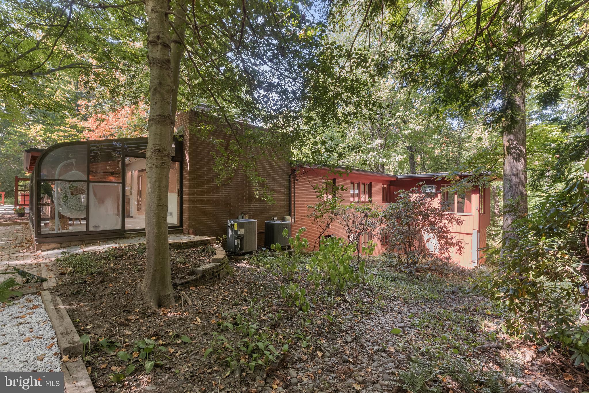 1725 St Giles Road Gibson Island, MD 21056 - Photo 38 of 43 Side of House to Lower Level, Private Wooded Lot