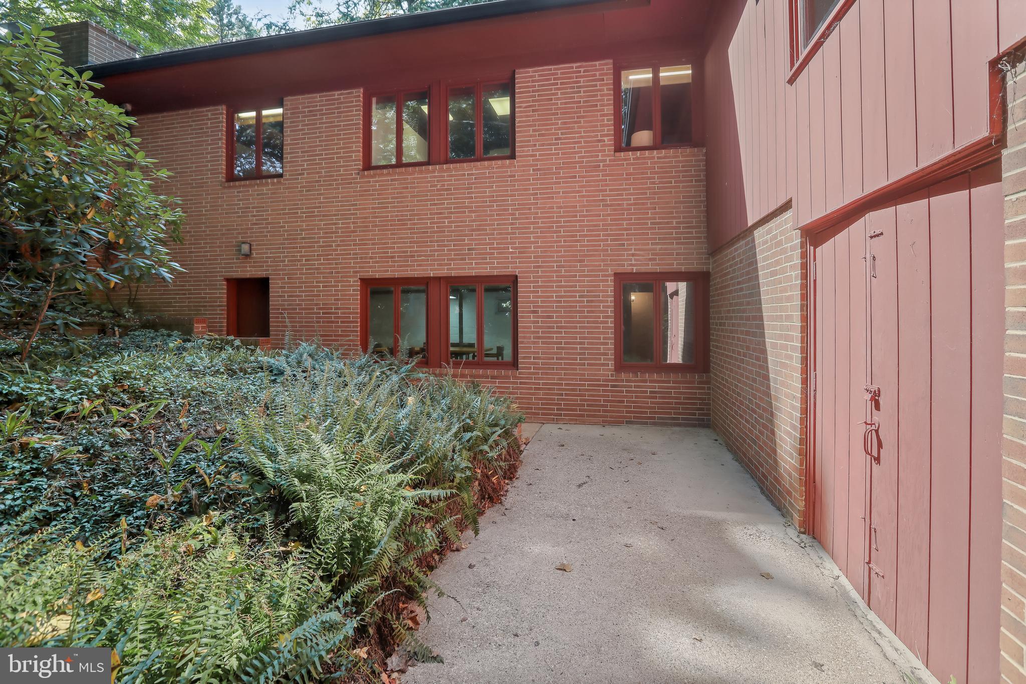 1725 St Giles Road Gibson Island, MD 21056 - Photo 39 of 43 Lower-Level Entry with Two Door Storage Shed