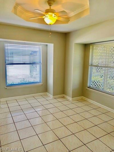 18477 Sunflower Road Fort Myers, FL 33967 - Photo 6 of 10 a view of an empty room and window