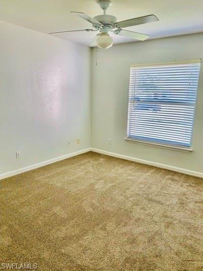 18477 Sunflower Road Fort Myers, FL 33967 - Photo 9 of 10 an empty room with a fan & a window