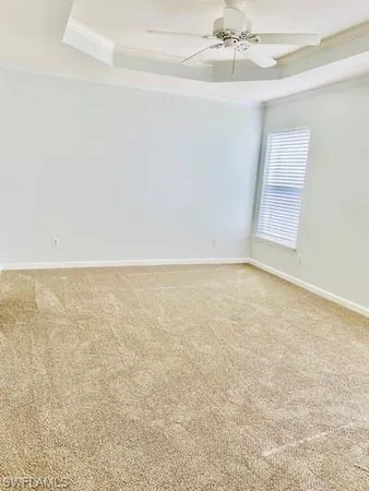 en empty room with fan