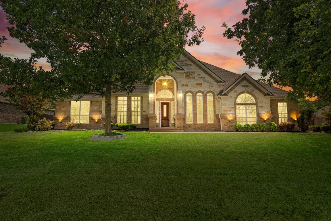 781 Eagle Landing Drive Belton, TX 76513 - Photo 1 of 1 a front view of a house with a garden