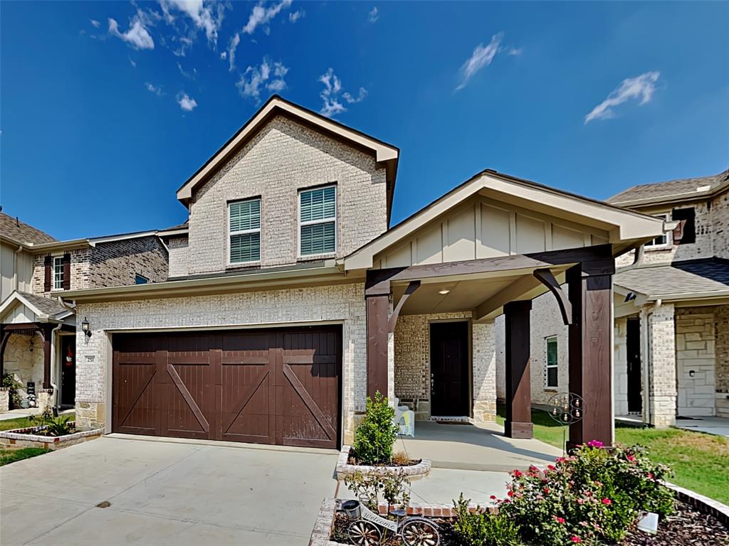 251 Novacek Street Irving, TX 75063 - Photo 1 of 18 a front view of a house with garden