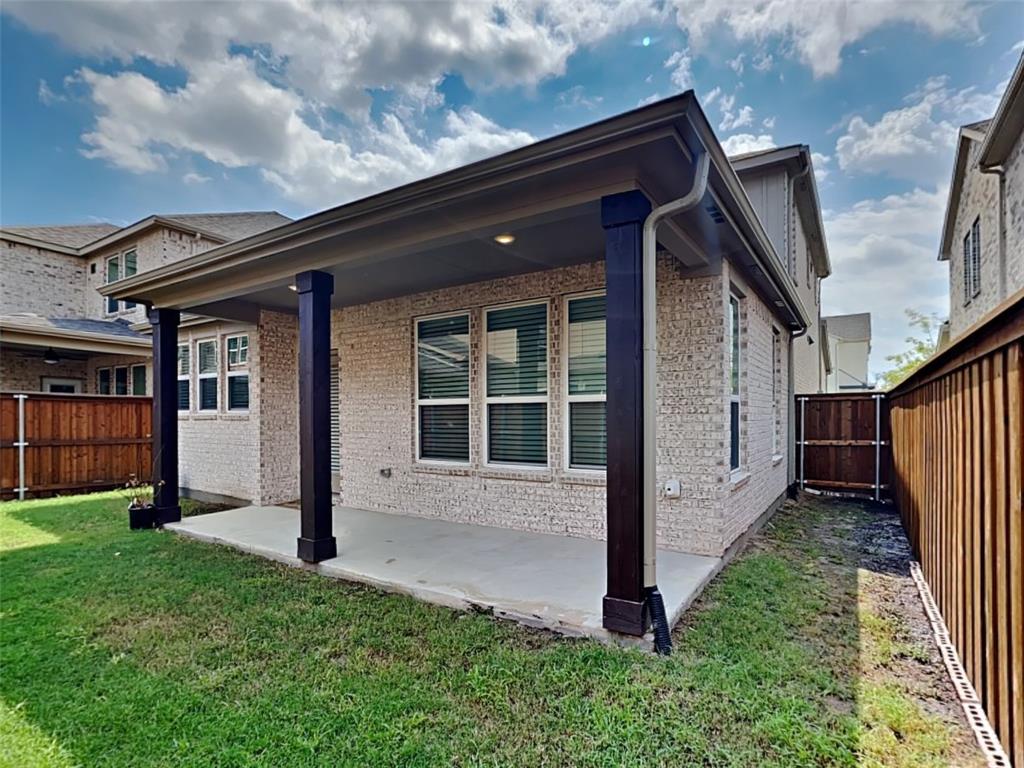 251 Novacek Street Irving, TX 75063 - Photo 18 of 18 a view of house with backyard