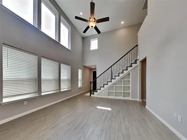 a view of an entryway with wooden floor