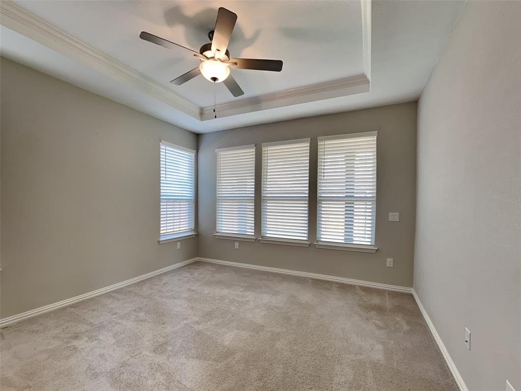 251 Novacek Street Irving, TX 75063 - Photo 7 of 18 a view of an empty room with a window